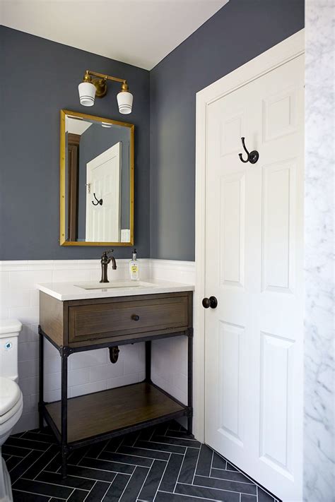 The most common blue bathroom tile material is metal. Classic Boys Bath with herringbone tile floor and white ...