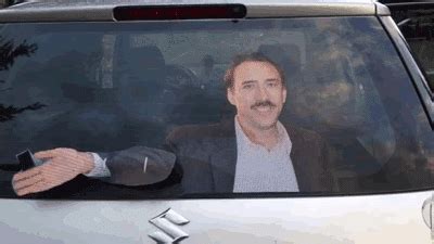 The Nicholas Cage Waving Windshield Wiper Animated Gif Funny Faxo
