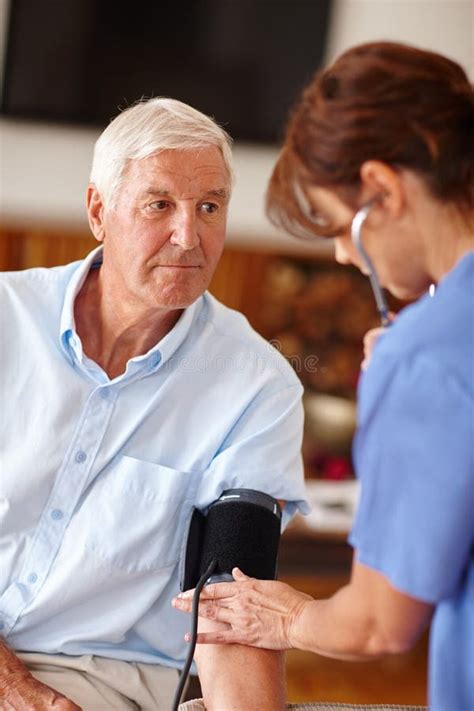 Focused On Quality Healthcare A Doctor Checking A Senior Patients