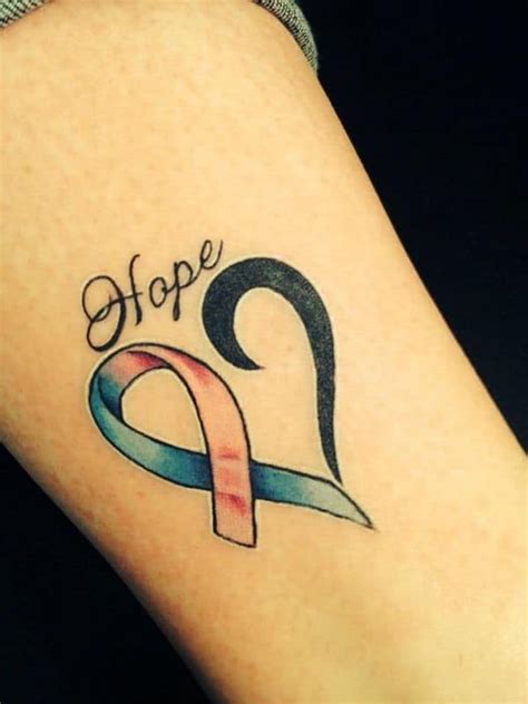 Green cross and grey ribbon tattoo on arm. 15 Mind Blowing Breast Cancer Tattoos Pictures - SheIdeas