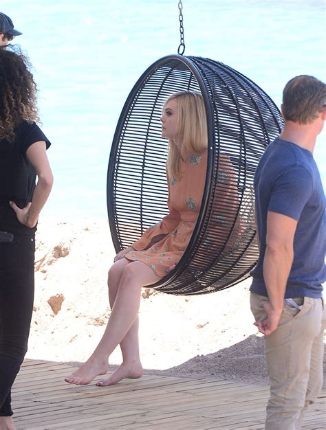 Elle Fanning On The Set Of A Photoshooting On The Beach In
