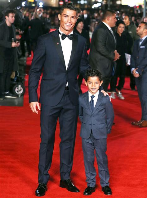 Find the perfect cristiano ronaldo stock photos and editorial news pictures from getty images. Cristiano Ronaldo Brings Look-Alike Son to Red Carpet ...