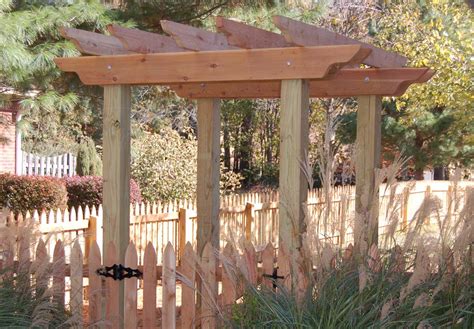 Wood Spaced Picket Fence And Arbor Franklin Fence And Deck