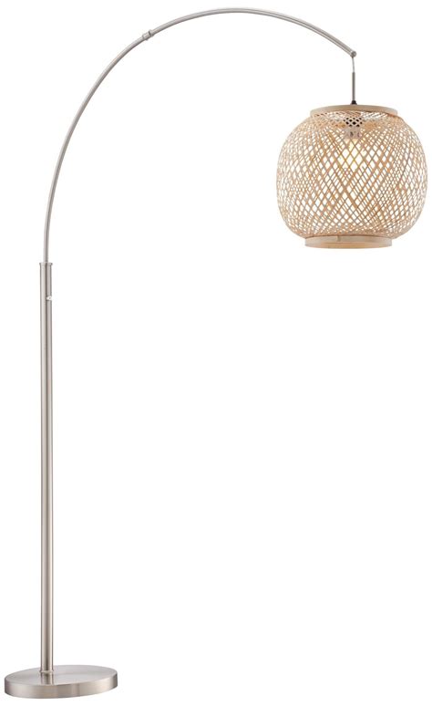 There is definitely something aerodynamic about arc with its asymmetric shade. Lite Source Evangeline Rattan Globe Steel Arc Floor Lamp # ...