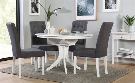 Smaller kitchens or apartment dining rooms are ideal for dinette sets that come with compact tables and two chairs. Hudson Round White Extending Dining Table with 6 Regent ...