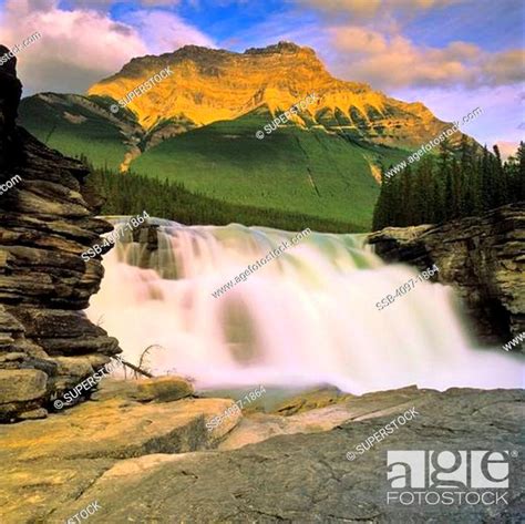 Waterfall With A Mountain In The Background Athabasca Falls Mt