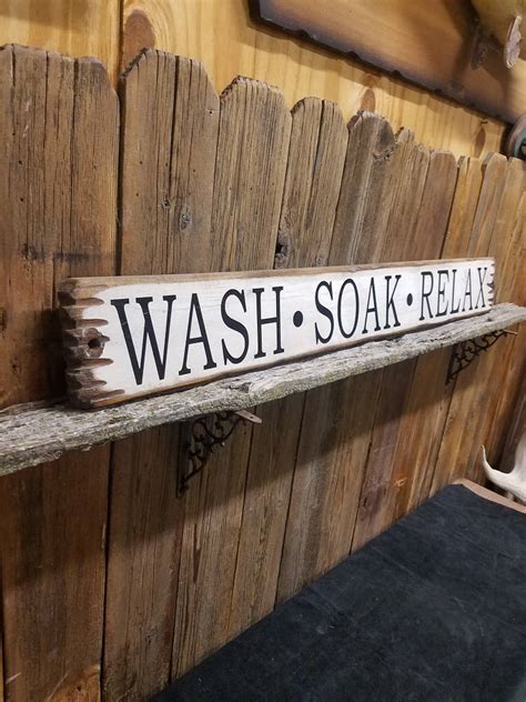 If you're a bath person, there's simply no better way to float away the day's troubles than in a nice, hot, relaxing vat of water. WASH SOAK RELAX Rustic Wood Sign/Bathroom/Cabin/Lodge/Spa ...