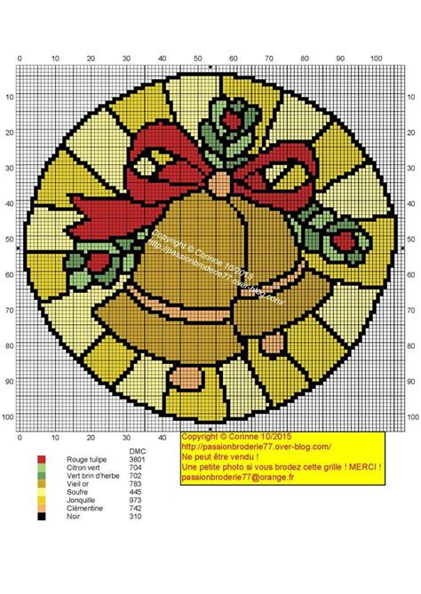 a cross stitch christmas ornament with a bell on it s side and a red bow