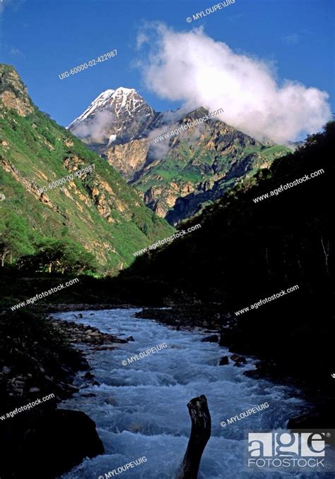 Kanjelaruwa Peak Rises Above A Himalayan River Valley Dolpo Nepal