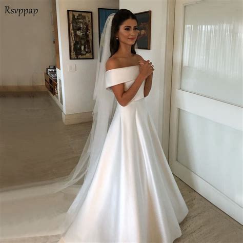Take a week of looking at wedding dresses off and on because trying to find a wedding dress in one day can cause you to blur your senses looking at one white wedding dress. Elegant Beach Wedding Dress 2019 A line Boat Neck Simple ...