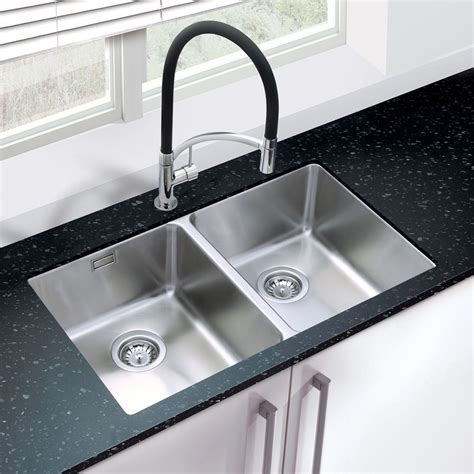Since the invention of the kitchen sink, homeowners and designers have been debating the merits of a single bowl vs. ORBIT 02 Double Bowl Undermount Kitchen Sink - Sinks-Taps.com