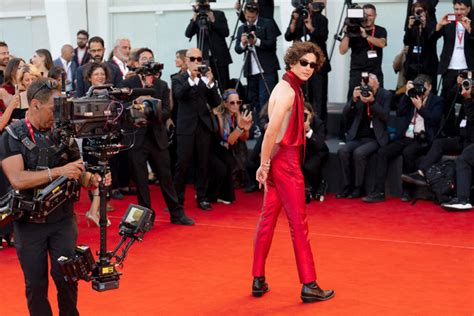 Timothée Chalamet s naked back on the red carpet in Venice Does anyone