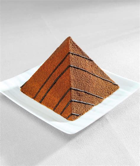 Trio Of Chocolate Pyramid A Base Of Milk Chocolate And Caramelised