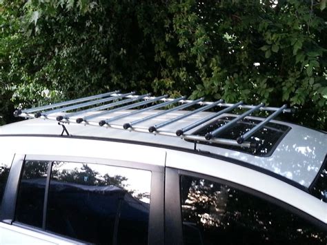 To carry long items without having the wind whip them around, you need a longer rack. DIY Auto Roof Rack ~ the words