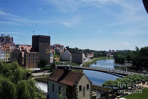Beautiful view over Zgorzelec, the Neisse river and old town bridge of Goerlitz Photograph by ...