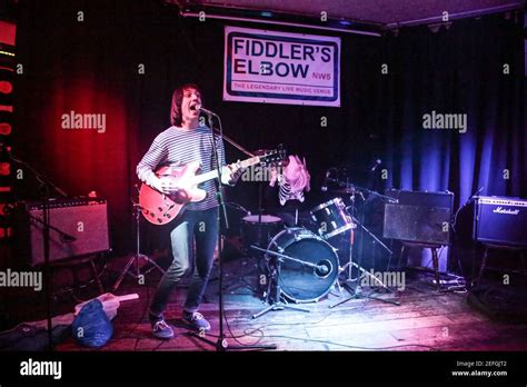 Rock Duo Tommy And Mary Performing Live On Stage At The Fiddlers Elbow In Camden London Stock