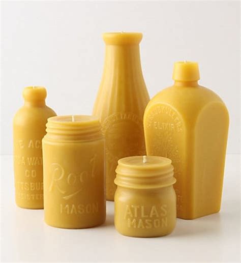 vintage bottle shaped candles for your wedding table centrepieces the natural wedding company
