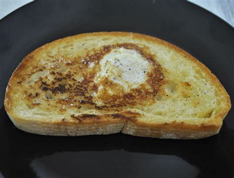 Toad in a hole is toasted bread with an egg cooked into the middle. How to Make Toad in the Hole (with Pictures) - wikiHow