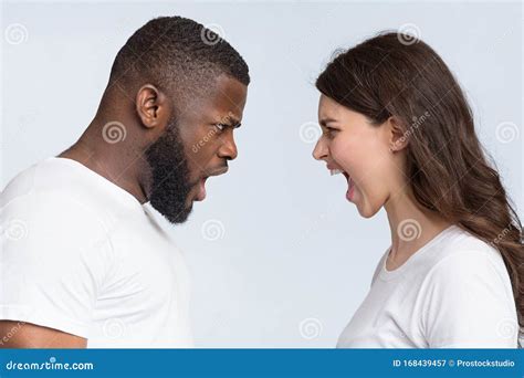 Interracial Couple Arguing Yelling At Each Other Having Relationship