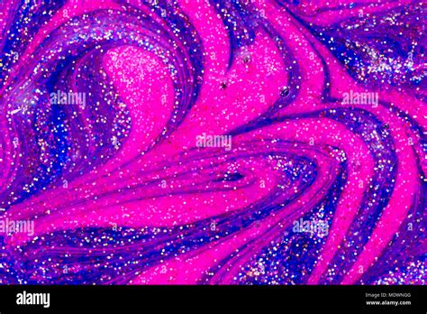 Abstract Silver Gold Pink And Blue Liquid Glitter Paint Swirl