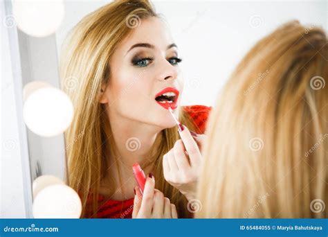 Beautiful Woman Applying Lipstick At The Mirror Stock Image Image Of Apply Eyelashes 65484055