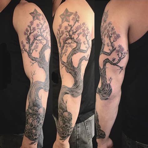 Finished Cherry Blossom Tree Tattoo With Skulls By Roots