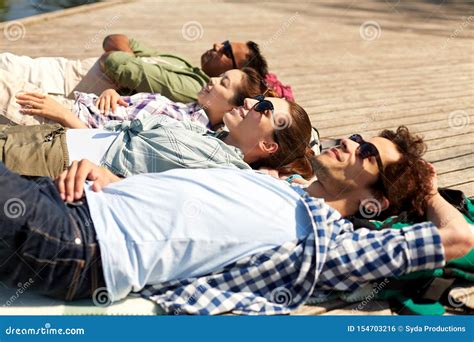 Happy Friends Chilling On Lake Pier Stock Photo Image Of Indian