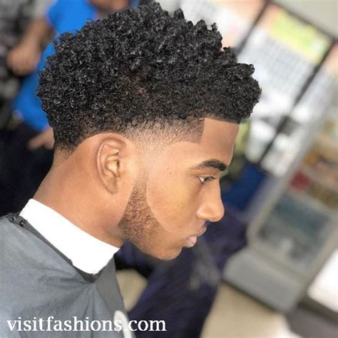 It starts a bit longer on the top and continues with a subtle gradient until it reaches the fully shaven part at the back of your neck. Latest Black Men Hairstyles Try At Least Once This