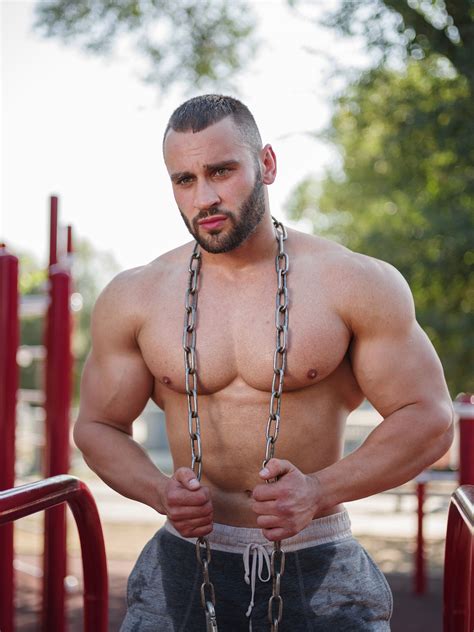 Flexing Sweaty Muscle Stuf With Chains And Beard Men Seeking Men