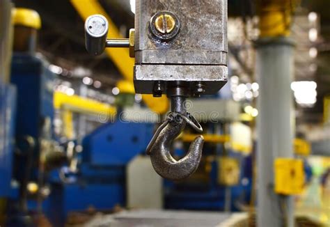 Crane Hook Of The Overhead Crane In The Workshop Of An Industrial Plant