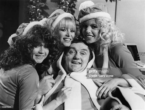 English Comedian And Writer Les Dawson And His Glamorous Assistants