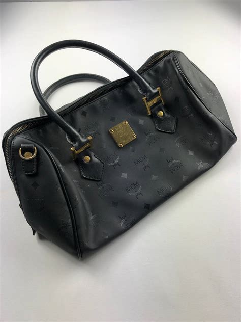 Mcm Mcm Black Canvas Leather Hand Bag Grailed