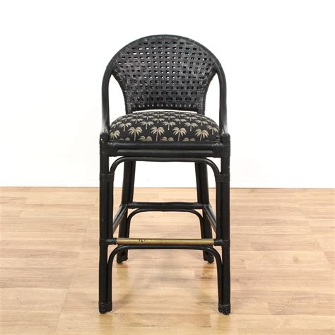 Encourage the gang to meet the neighborhood newbies when you invite everyone over. This bar stool is featured in a durable black woven wicker ...