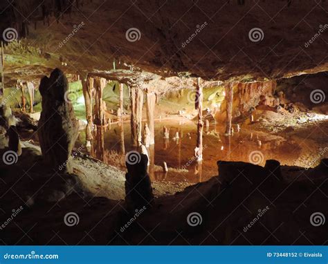 Illuminated Lake Inside Of A Dripstone Cave Stock Photo Image Of