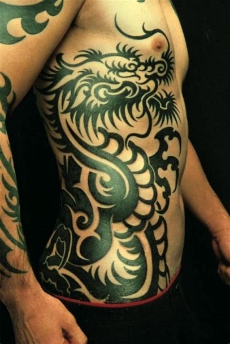 Great Tribal Black Dragon Tattoo On Ribs Tattooimages Biz
