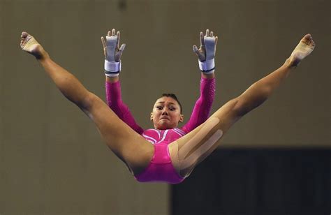 Kyla Ross Of The US Performs On The Uneven Bars During The Women S Qualification At The
