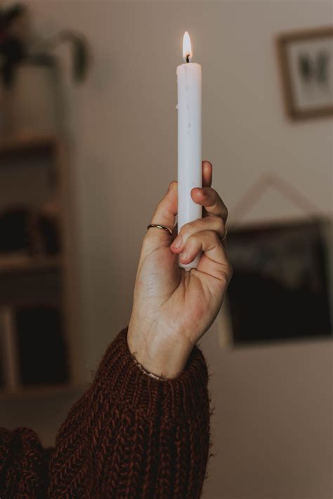 Person Holding White Candle · Free Stock Photo