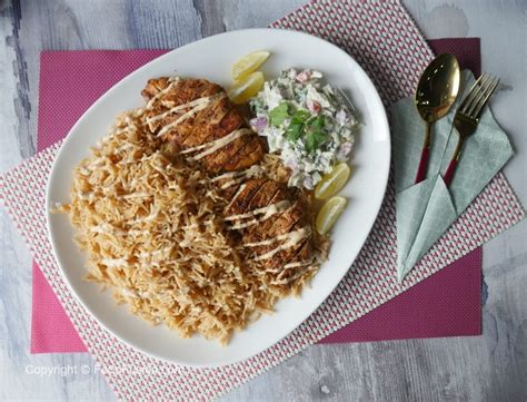 This clever plate of lamb and tahini is perfect for sharing with whoever happens to drop in. Shawarma Rice Platter - Food Fusion