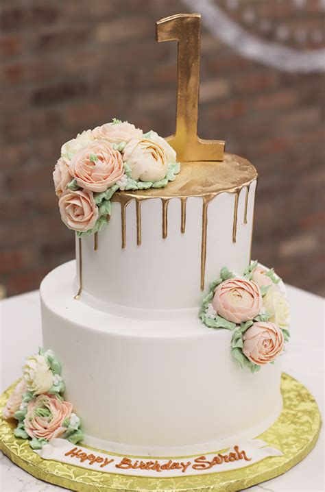 Choose the cake flavor, filling and icing then add your mesage. First Birthday Cake with Gold Drip and Buttercream Flowers