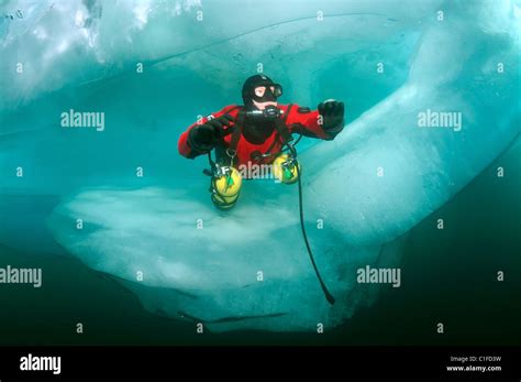 Scuba Diver With Sidemount Under Ice In Lake Baikal Siberia Russia