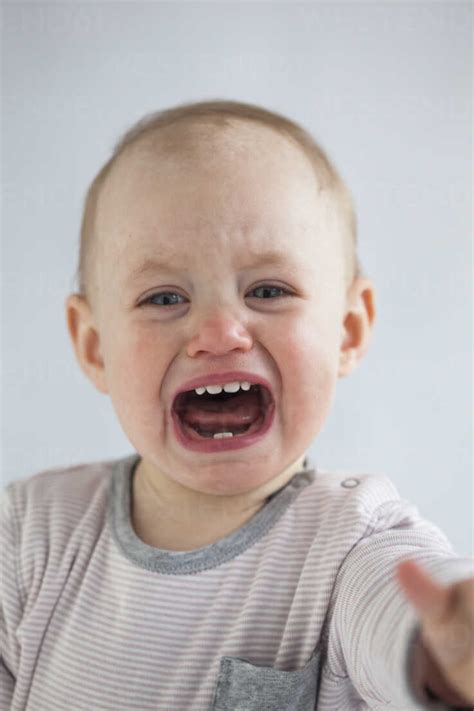 Portrait Of Screaming Baby Girl Stock Photo
