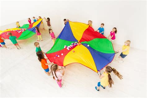Kids Playing Parachute Games In Light Gym Stock Image Image Of