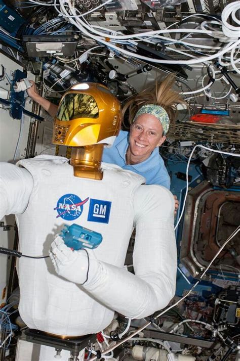 Karen Nyberg Expedition 36 Flight Engineer Is Pictured With Robonaut 2 The First Humanoid