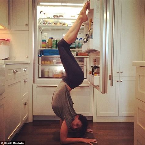 Hilaria Baldwin Shows Off Toned Legs In Acrobatic Yoga Pose On Ship