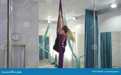 Flexible Gymnast Doing Stretching Leg On Aerial Silk Stock Video