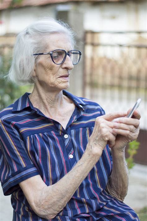 Mature Senior Woman Grandma Texting On Cell Phone Stock Image Image Of Sitting Texting 17620935