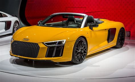 With a car as flashy as the r8, we'd suggest going with the spyder. 2017 Audi R8 Spyder Photos and Info | News | Car and Driver