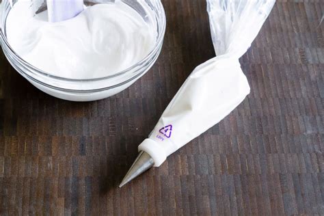 Beat the powdered sugar, water and meringue powder in a large bowl until icing forms peaks. How to Fill a Piping Bag | Royal icing, Royal icing recipe, Meringue powder