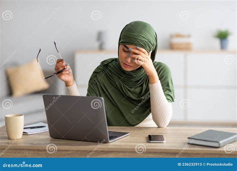 Arab Female In Hijab Feeling Tired Rubbing Irritated Eyes Using