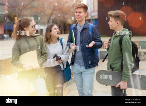 Teenage Students Talking Outside After Lessons Stock Photo Alamy